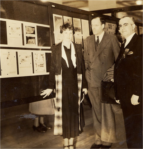 Earhart with husband George Putnam (center) and airmail specialist Nicolas Sanabria (right) at 1936 stamp exhibition