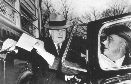 Roosevelt deposits a letter into a Highway Post Office Bus