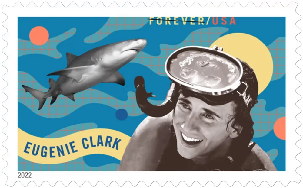 Eugenie Clark stamp featuring a shark and Eugenie Clark wearing a snorkle