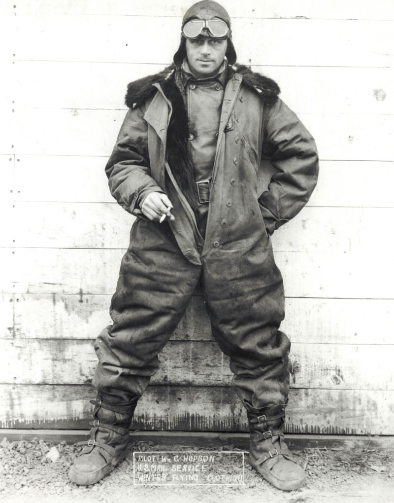 Airmail pilot William C. “Wild Bill" Hobson posing for a photo in his leather suit