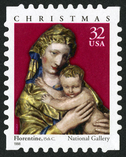 Postage stamp featuring a sculpture of the Madonna and Child, painted and gilded terracotta