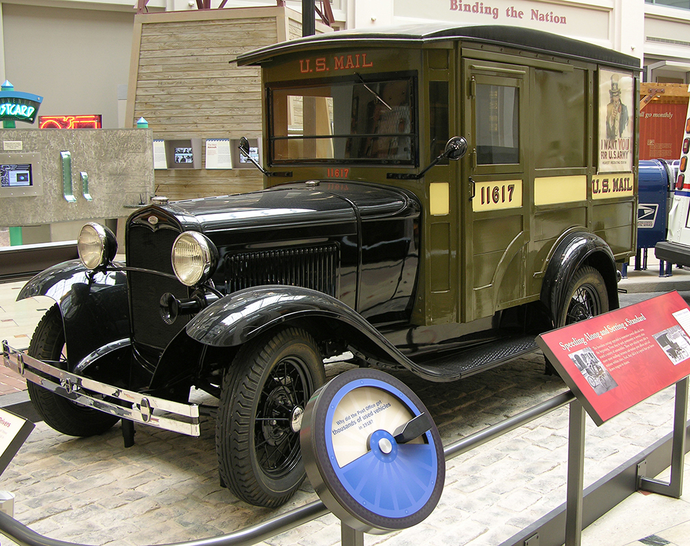 A fully restored 1931 Ford Model A Parcel Post truck on display in the Museum's atrium