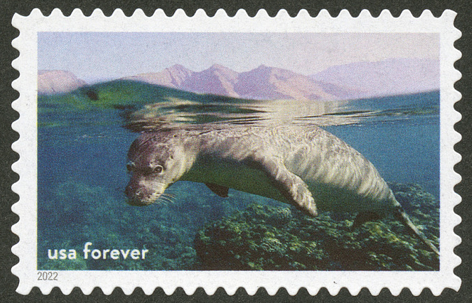 stamp featuring a National Marine Sanctuaries swimming Hawaiian monk seal