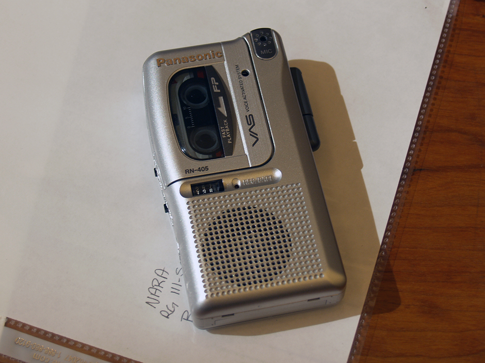 silver-colored portable audio micro cassette recorder