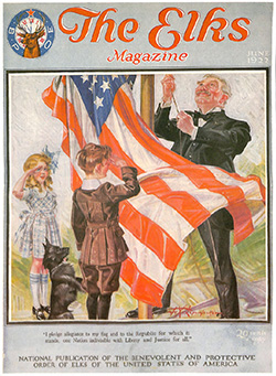 The Elks Magazine cover, June 1922, shows a man and two children raising a USA flag