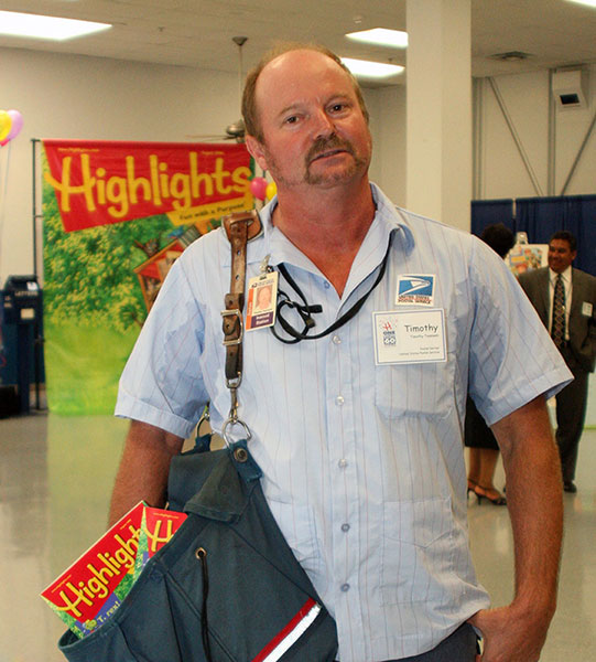 Timothy Teamann, a 26-year veteran of the United States Postal Service, delivers the one-billionth copy of Highlights magazine.