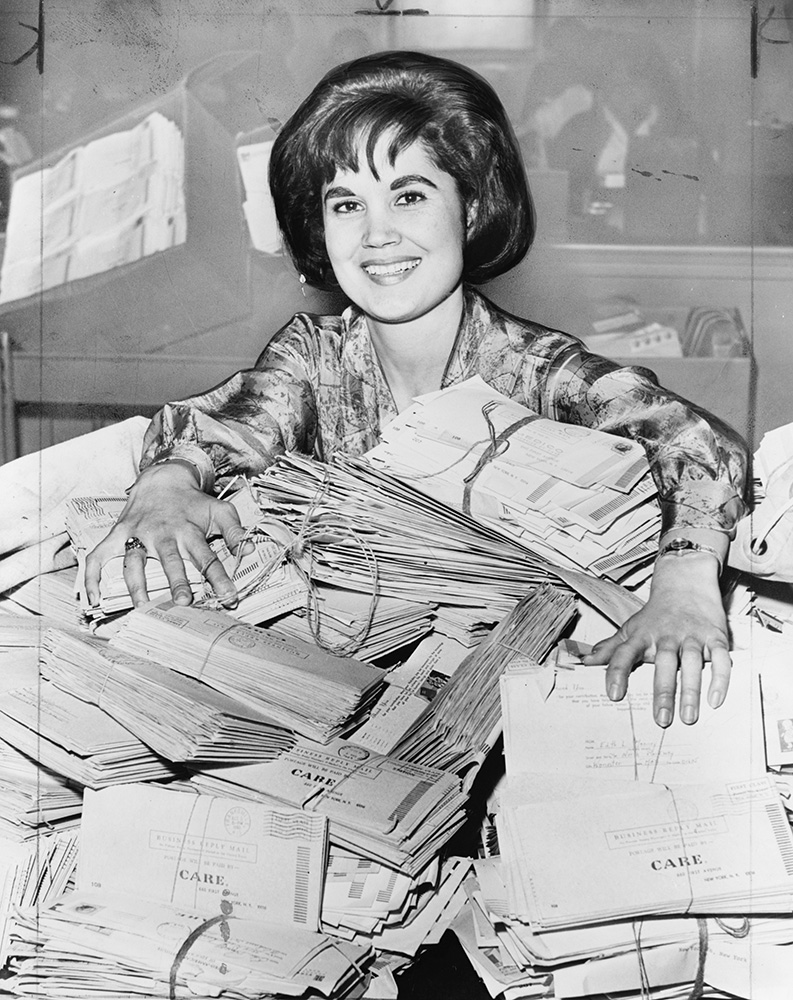 CARE Worker with Mailed Donations, 1963
