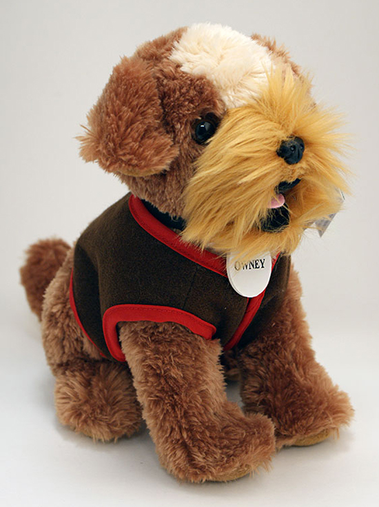 A fluffy stuffed animal version of Owney the dog.