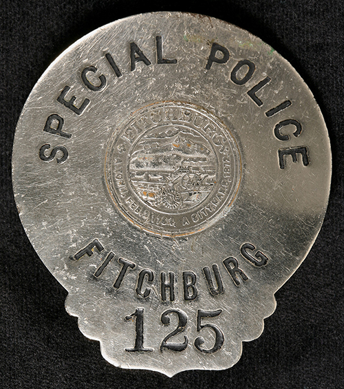 Badge used by a criminal to impersonate a police officer