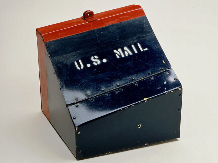 One of the two blue and red U.S. Mail Regulus I mail containers